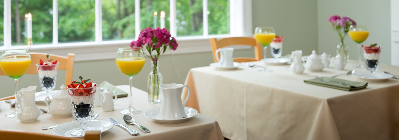 breakfast tables set in dining room
