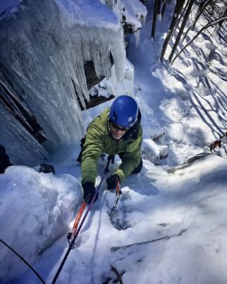 Man ice climbing at Camden Hills State park